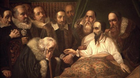 Gemälde: Calvin auf dem Sterbebett, zahlreiche Menschen um ihn herum